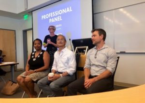 Laurie Churchman introducing panelists for a discussion on "reimagining retirement" at Johns Hopkins University’s Carey Business School.