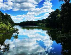 Centennial Lake beneath fluffy white clouds in Summer - Ellicott City, Maryland, USA | by Deborah Silverman